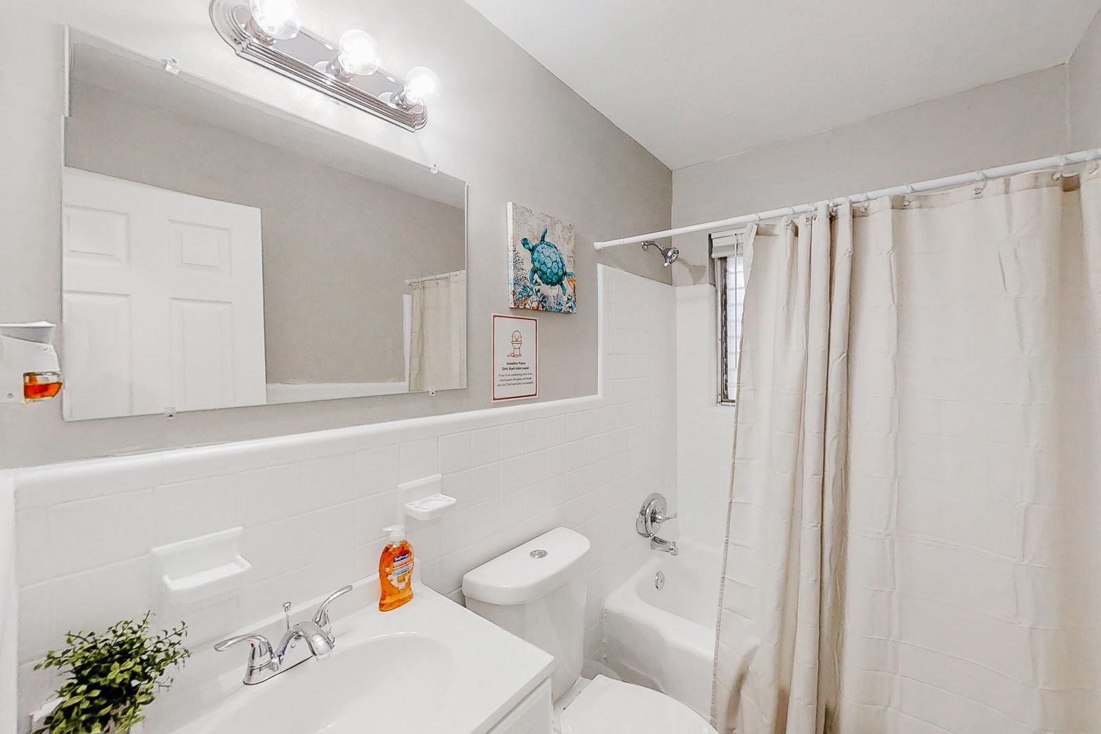 Full bathroom with tub and shower