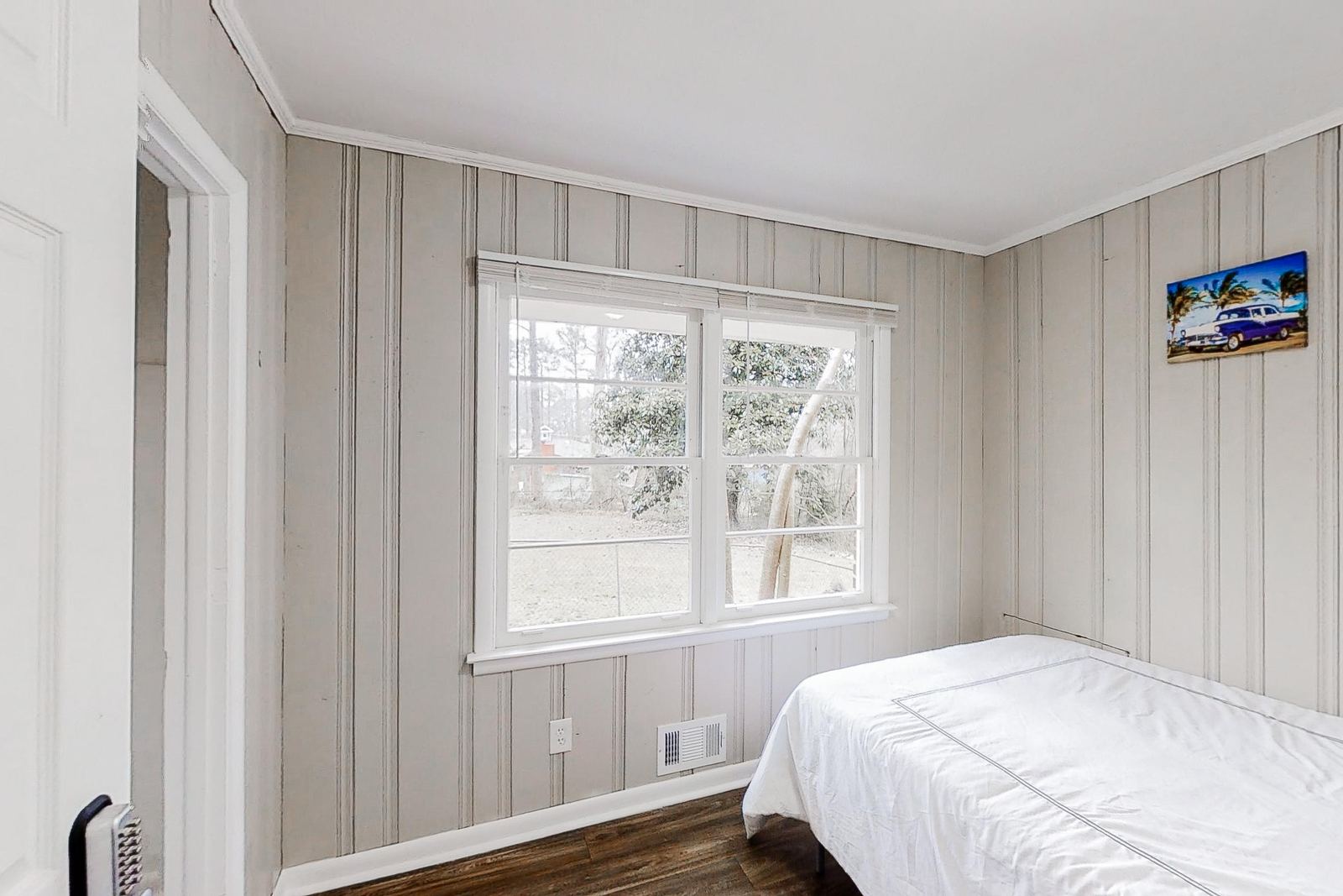 Bedroom with large picture window